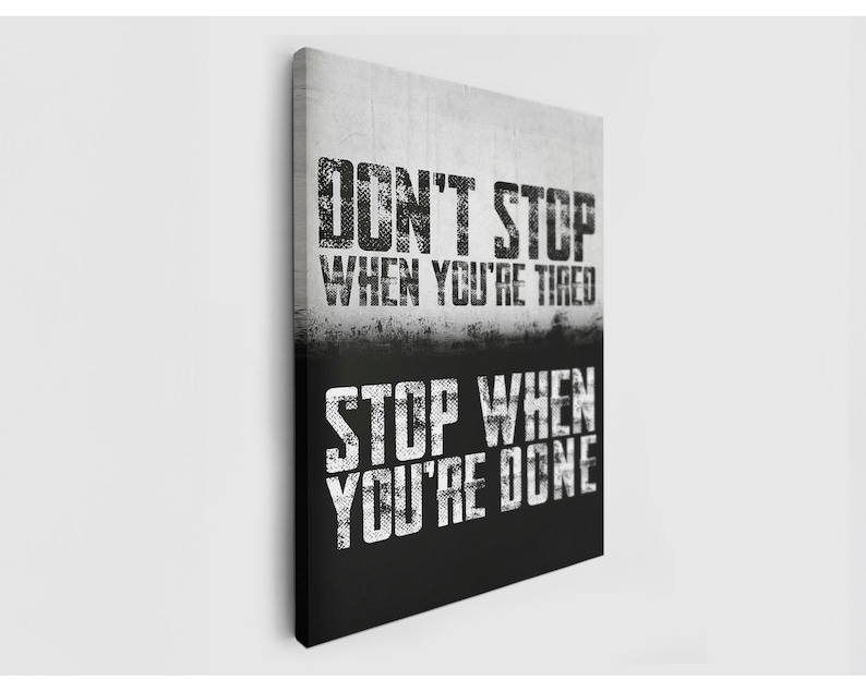 The image is a motivational poster with the text "DON'T STOP WHEN YOU'RE TIRED" and "STOP WHEN YOU'RE DONE" printed on it.