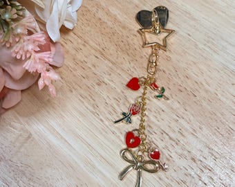 Accesorio para Kindle con lazo dorado y corazón y rosa