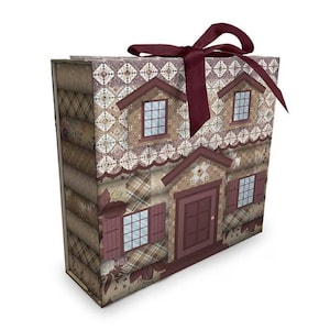 May include: A decorative gift box shaped like a house, featuring a burgundy ribbon bow. The box is adorned with a patchwork design in shades of brown, beige, and burgundy, with house details like windows and a door.
