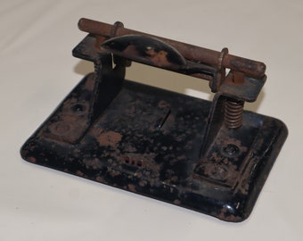 Vintage two hole punch - rusty black