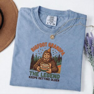 Comfort Colors® Bigfoot Grandpa Birthday Shirt, Funny Sasquatch Grandpa Tee, The Legend Keeps Getting Older Gift Shirt