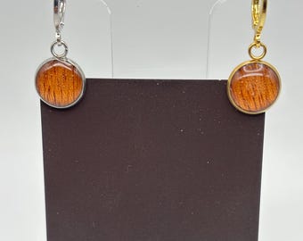 Pendientes de aro de sapeli en oro o plata.