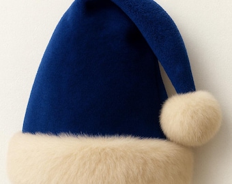 May include: A deep blue velvet Santa hat featuring a thick, cream-colored faux fur trim around the base and a matching cream-colored faux fur pom-pom attached to the tip of the hat, which is folded over to the right side.
