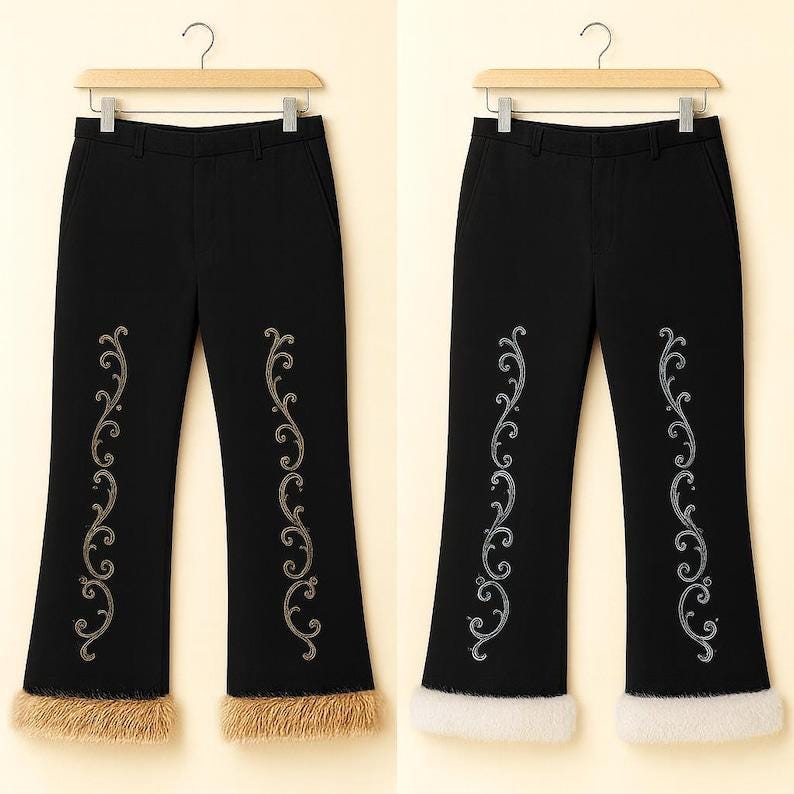 Puede incluir: Dos pantalones negros colgados en perchas de madera. Cada par presenta un bordado vertical de volutas plateadas en la parte delantera de las piernas y un borde grueso de piel sint&eacute;tica texturizada en el dobladillo inferior de las perneras.
