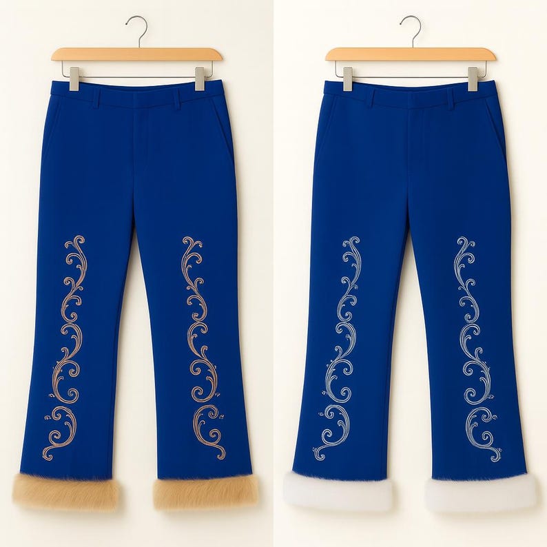 Puede incluir: Dos pantalones azul real colgados en perchas de madera. Cada par presenta un patr&oacute;n de bordado de enredaderas verticales en las piernas y un borde grueso de piel sint&eacute;tica en el dobladillo. Un par tiene bordado y piel beige, el otro es blanco.