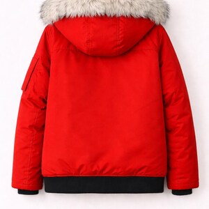 May include: A red winter jacket with a hood and a faux fur trim. The jacket has a black ribbed hem and cuffs, and a small pocket on the left sleeve. The jacket is hanging on a hanger.