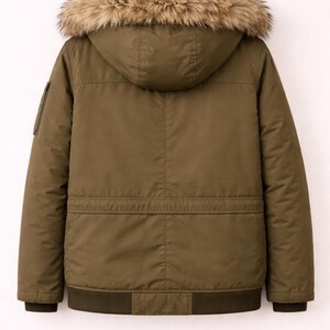 May include: Olive green winter jacket with a hood and faux fur trim. The jacket has a bomber-style bottom and a small pocket on the left sleeve. The jacket is hanging on a wooden hanger.