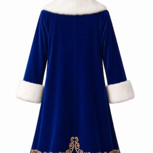 May include: A royal blue velvet coat featuring a white faux fur collar and matching white faux fur cuffs on the long sleeves. The hem is decorated with an intricate gold embroidered scrollwork pattern above a wide white faux fur border.