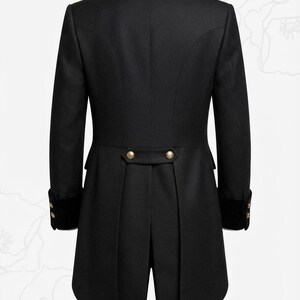 May include: A black tailcoat jacket featuring a velvet collar and cuffs, a back waist tab with two gold-toned buttons, and additional gold-toned buttons on each sleeve cuff. The garment has a structured fit with a long, split tail design.