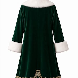 May include: A dark green velvet coat featuring a white faux fur collar and matching white faux fur cuffs on the long sleeves. The hem is trimmed with white faux fur and decorated with an intricate gold embroidered scrollwork pattern.