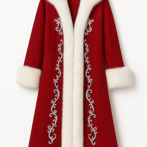 May include: A long, deep red coat featuring a thick white faux fur trim along the collar, cuffs, and hem. The front of the coat is decorated with intricate silver embroidery in a scrolling vine pattern that runs vertically along the opening.