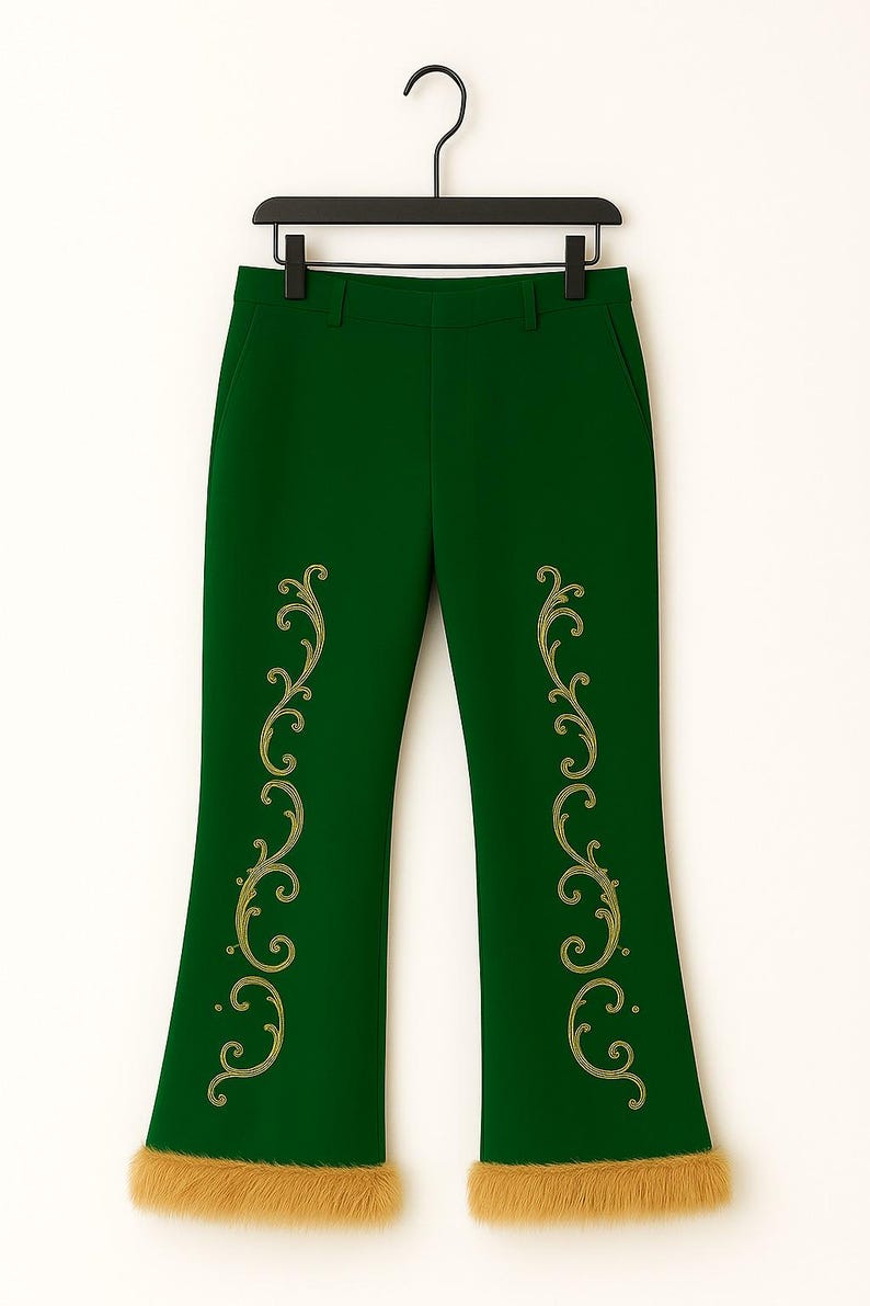 May include: Dark green trousers featuring gold-colored embroidered scrollwork patterns running vertically down the front of each leg. The hem of each pant leg is finished with a thick, textured tan-colored faux fur trim.