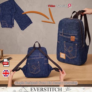 May include: A backpack crafted from dark blue denim jeans featuring brown contrast stitching, a rear pocket with a decorative swirl design, and dark brown adjustable shoulder straps. The design includes a rectangular patch and a top handle.