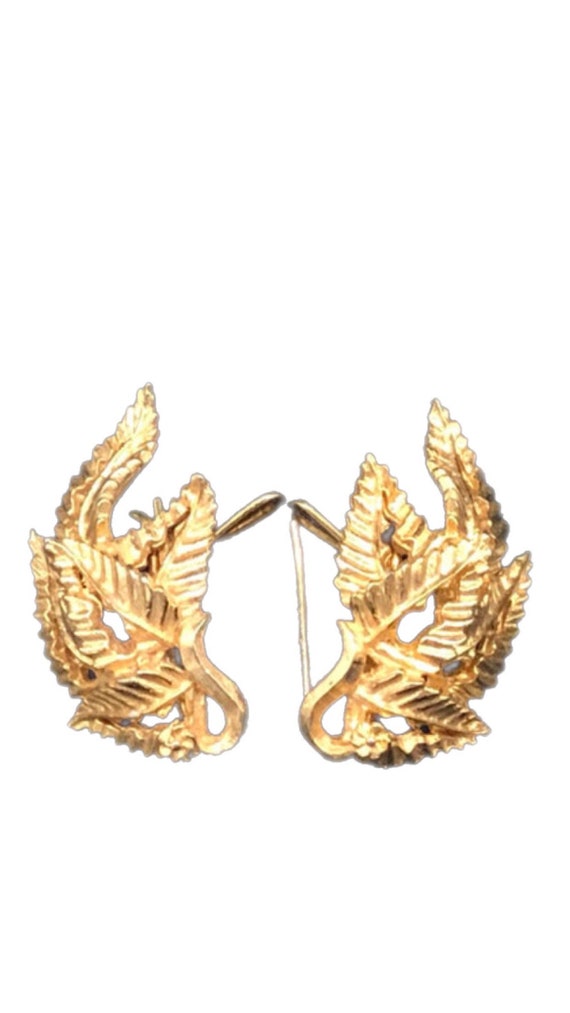 Vintage Judith McCann wingback earrings, gold tone