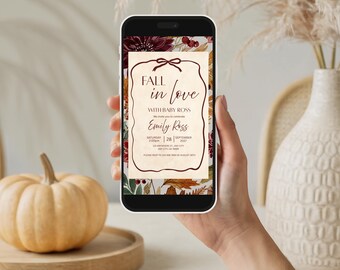 Plantilla de invitación animada para baby shower con temática otoñal "Enamórate de un bebé" para móvil, ideal para ver videos. Se puede editar en Canva desde tu teléfono.