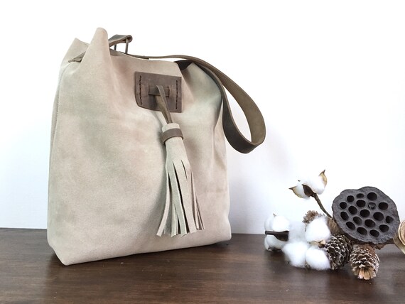 beige suede handbag