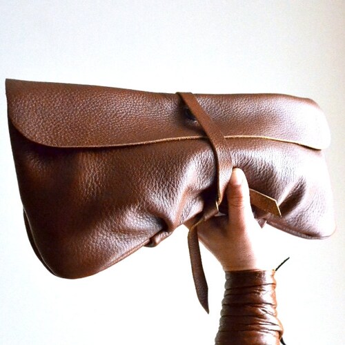 tan evening clutch
