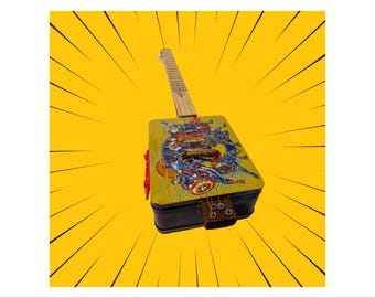 Guitarra de la caja de almuerzo de los Vengadores