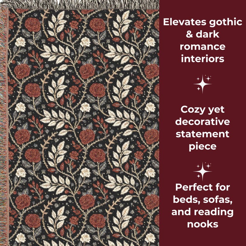May include: A black throw blanket with a repeating pattern of red roses, white flowers, and green leaves. The blanket has a fringed edge and is suitable for beds, sofas, and reading nooks.