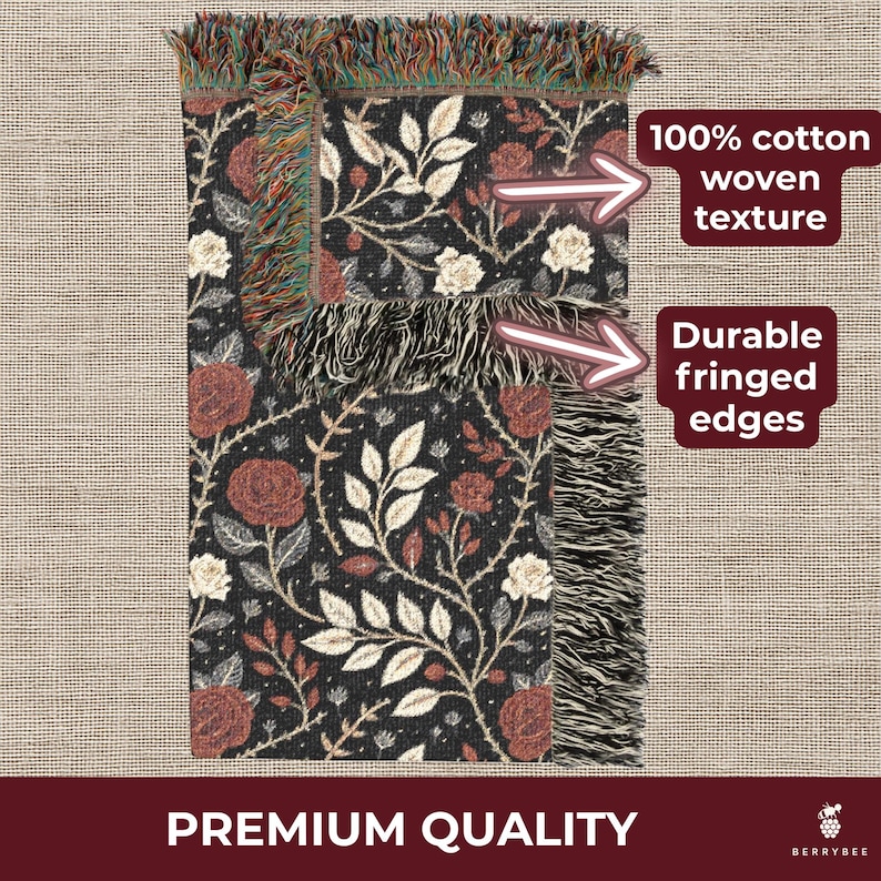 May include: A black woven throw blanket with a floral pattern of red roses and cream-colored leaves. The blanket has fringed edges and the text "100% cotton woven texture" and "Durable fringed edges". The words "Premium Quality" are also visible.