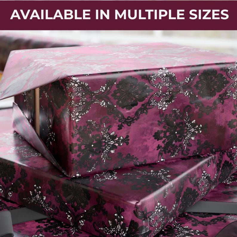 May include: Gift wrap with a damask pattern in shades of burgundy, black, and silver. The wrapping paper is layered, with the top layer partially open, revealing the box underneath. Text at the top reads "AVAILABLE IN MULTIPLE SIZES."