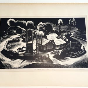 May include: A monochrome print depicting a rural scene with a farm, buildings, trees, and a winding road. The artwork shows a detailed farm scene with animals and a person tending to sheep. The print is mounted on a white background.