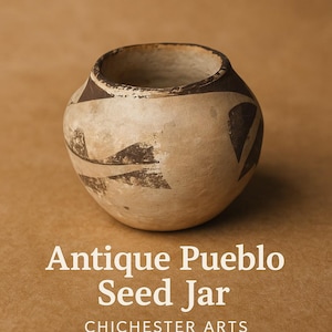 May include: Antique Pueblo seed jar with a rounded body and a wide opening. The jar is off-white with dark brown geometric designs. The text "Antique Pueblo Seed Jar" is displayed in white font.
