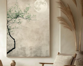 Puede incluir: Impresión artística en lienzo enmarcada que presenta un paisaje sereno. Una rama de árbol negra con hojas verdes se extiende por el lado izquierdo, con una luna llena en la parte superior derecha. El fondo es de color neutro.