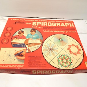 May include: A vintage Spirograph set in a red box. The box features illustrations of children using the Spirograph and examples of the patterns it creates. Text on the box reads "Kenner's New Spirograph" and "For all ages."