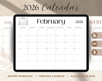 May include: A digital calendar for 2026 displayed on a tablet, featuring the month of February. The calendar has a clean, minimalist design with a white background and black text. The words "2026 Calendar" are at the top. The calendar is available for instant download.