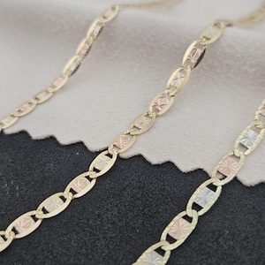 10K solid gold tri-color Valentino bracelet featuring yellow, rose, and white gold diamond-cut textured links with a lobster clasp.