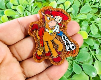 Jessie Cowgirl Acrylic flatback: Set/2 Cartoon Acrylic charm, Badge Reel Topper, Glitter planar resin, Hair bow center.