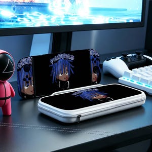 May include: Black Nintendo Switch case and console with a cartoon character design featuring blue hair and the word "POLLUTANTS". The case is white with a black zipper. The console has matching artwork.