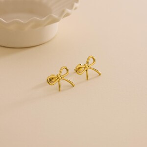 gold plated dainty bow earrings stainless steel hypoallergenic elegant and timeless design