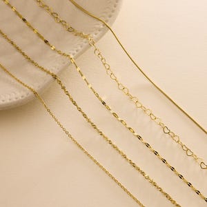 Elegant cable, snake, twist, heart, and sequin chains in silver finish everyday wear perfect for any outfit or occasion.