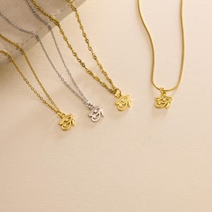 Tiny Eye of Ra gold necklace, ancient Egyptian jewelry for protection and balance, perfect meaningful gift for men and women.