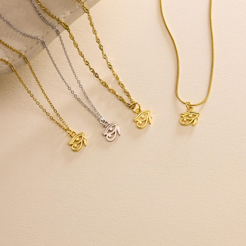 Tiny Eye of Ra gold necklace, ancient Egyptian jewelry for protection and balance, perfect meaningful gift for men and women.