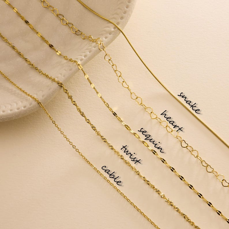 tiny cable, snake, twist, heart, and sequin chains in gold finish statement jewelry
perfect for any outfit or occasion.