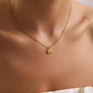 Meaningful gold Eye of Horus necklace presented in a gift box, perfect for Christmas, birthdays, or spiritual celebration gifts.