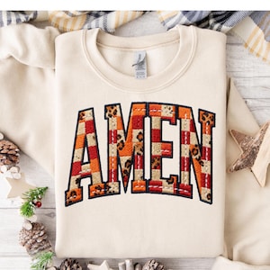 May include: A trio of ceramic mugs with a speckled, matte finish in cream, light grey, and dark grey. Each mug features a simple, minimalist design, ideal for tea or coffee.