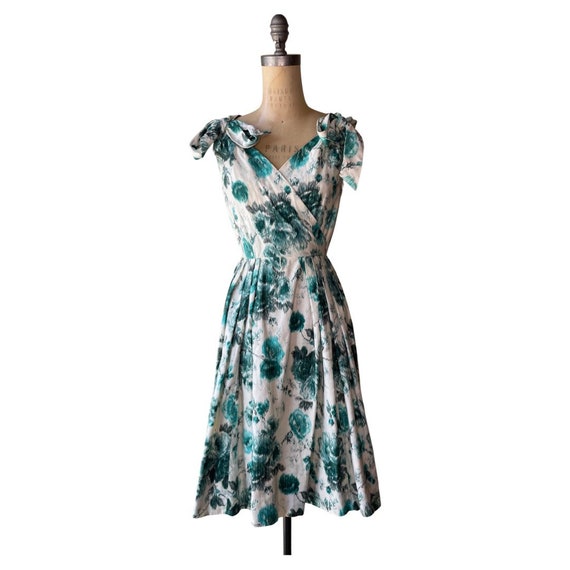 1950s teal and white floral dress