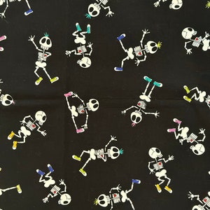 May include: Black fabric with a repeating pattern of white skeletons in various poses. Each skeleton has colorful sneakers and a small heart. The skeletons are in different positions, some upright, some upside down.
