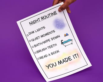 May include: A white sheet of paper with a black border, held against a purple background. The text "NIGHT ROUTINE" is at the top, with a list of tasks including "DIM LIGHTS" and "READ A BOOK". The bottom says "YOU MADE IT!"