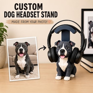 May include: A custom dog headset stand featuring a dark gray and white dog figurine with a black headset resting on its head. The image includes text that reads CUSTOM DOG HEADSET STAND and MADE FROM YOUR PHOTO, alongside a photo of the dog.
