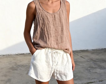 Löst linne i ramibomull, ärmlös sommarblus med rund hals, minimalistiskt linne med breda ärmhål, skjorta i tvättad naturfiber