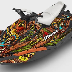 May include: A Sea-Doo personal watercraft featuring a vibrant graphic wrap with orange, yellow, and green tropical foliage, hibiscus flowers, and stylised tiki mask faces. The watercraft has a black hull, black handlebars, and a white seat.
