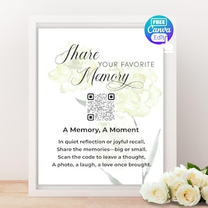Pode incluir: Impressão emoldurada com a frase "Share Your Favorite Memory" em escrita elegante, com um código QR e detalhes florais. O texto abaixo diz "A Memory, A Moment" com texto descritivo adicional. Um distintivo "Free Canva Edit" é visível.