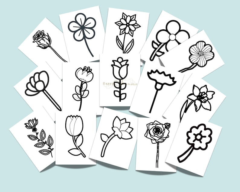 May include: A collection of rectangular white cards featuring black line art illustrations of various flowers. Each card displays a unique botanical drawing, including roses, tulips, and daisies, arranged in a scattered, overlapping layout.