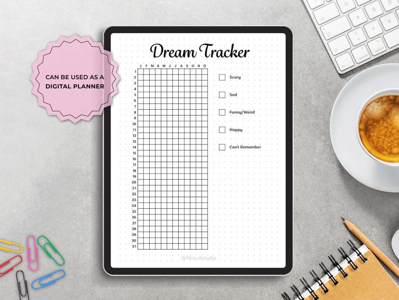 May include: A digital dream tracker displayed on a tablet. The black and white planner includes a grid for tracking dreams, with options to mark if dreams were scary, sad, funny/weird, happy, or if they couldn't be remembered. A pink sticker says "CAN BE USED AS A DIGITAL PLANNER."