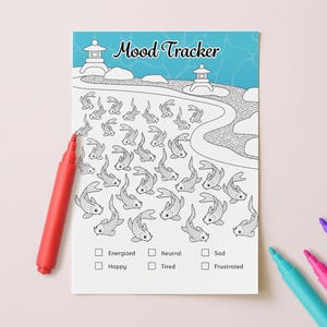 May include: A white mood tracker sheet with a koi pond design and the words "Mood Tracker" at the top. A red marker is next to the sheet, with other colored markers in the background. The tracker has boxes to check for different moods.